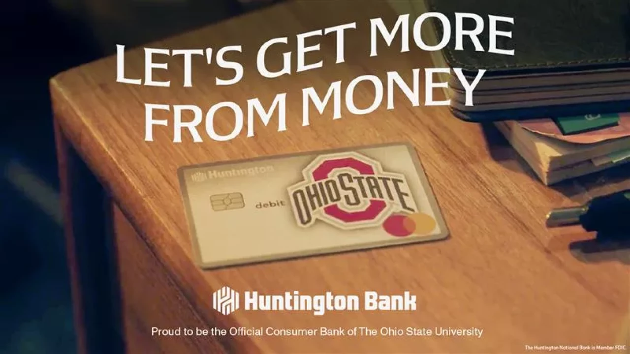 Graphic of a Huntington credit card on a surface with school materials around it.